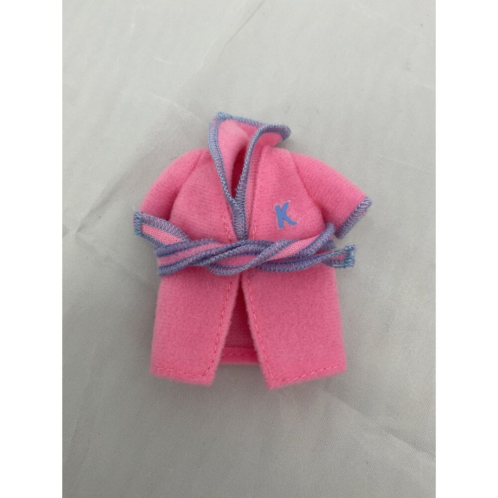 vintage Barbie Kelly doll bathrobe with blue stitching and a 'K' initial